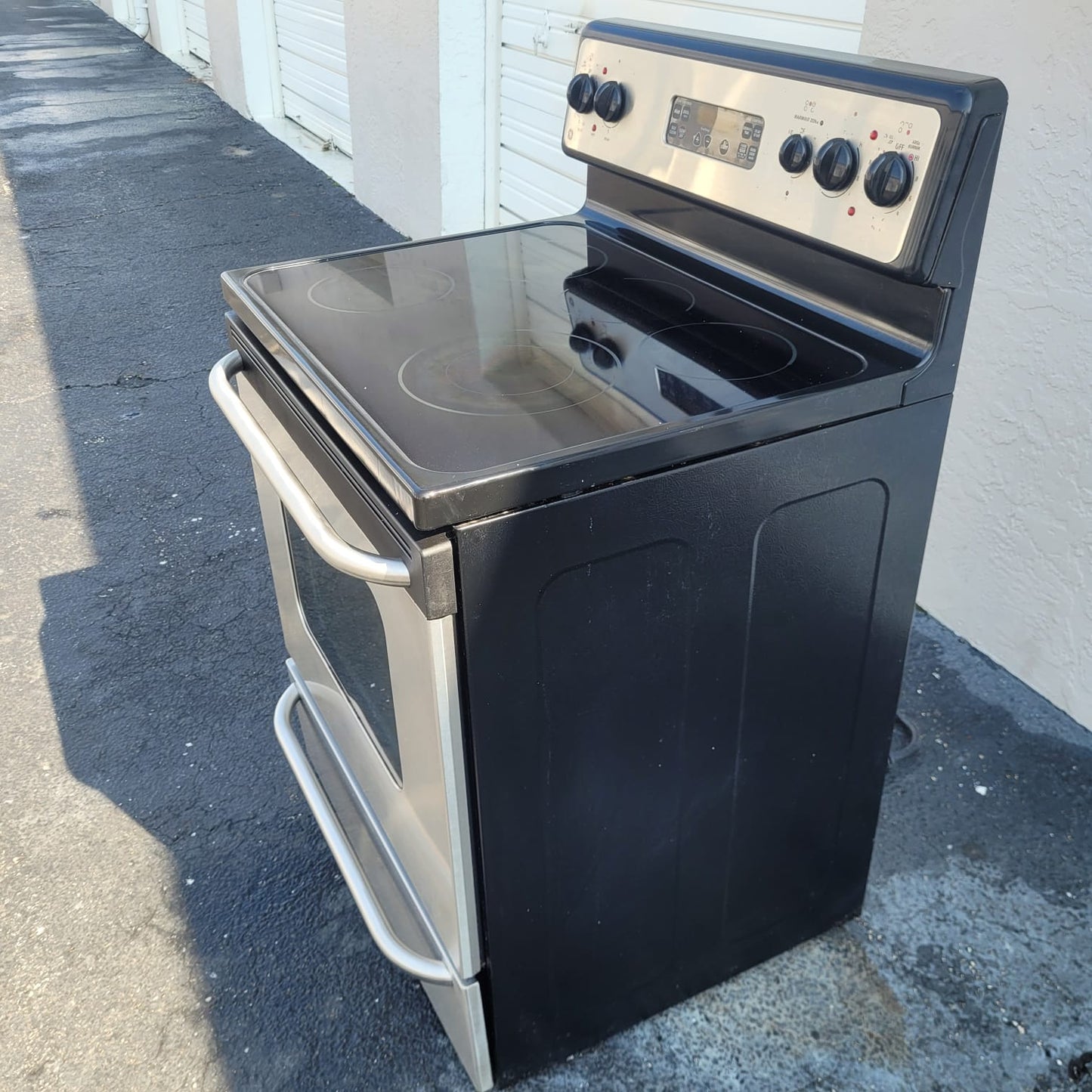 GE stainless steel stove with self cleaning oven $350